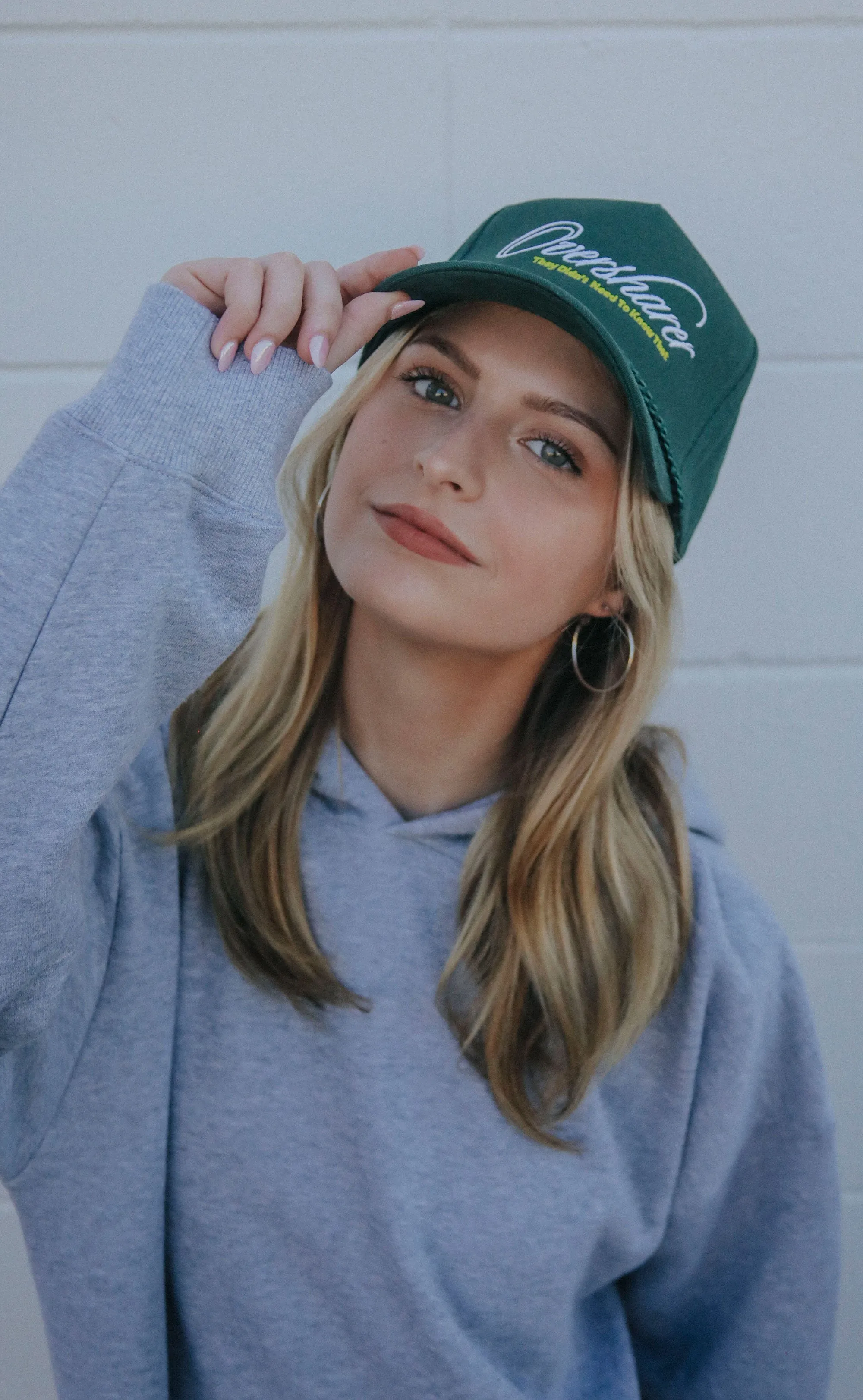 friday   saturday x jo johnson overby: oversharer trucker hat